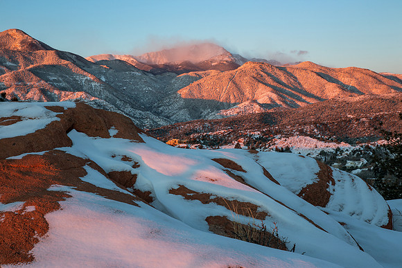 14.9 MB, 5184 x 3456: A snowy sunrise in the Garden of the Gods with Pikes Peak mountain in the background.