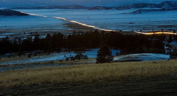 14.3 MB, 5184 x 2826: Car headlights and taillights show traffic over Wilkerson Pass, Colorado.
