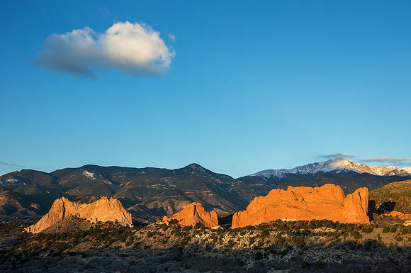 8.97 MB, 4653 x 3090: Garden of the Gods and Pikes Peak under a spacious blue sky and one puffy white cloud.