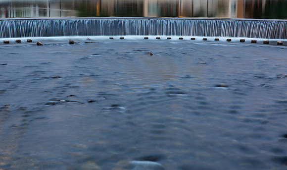 9.76 MB, 5263 x 3109: Water cascades over a small man made waterfall giving a sense of calm.