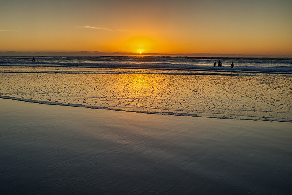 13.2 MB, 5927 x 3951: Surfers the last remaining sun light on Mission Beach.