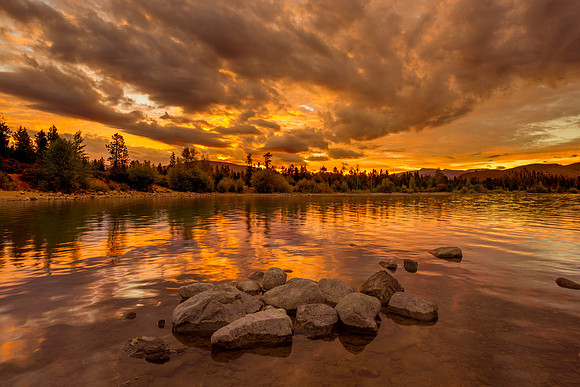 Orange Quietude: Rising Sun Over Dillon Reservoir