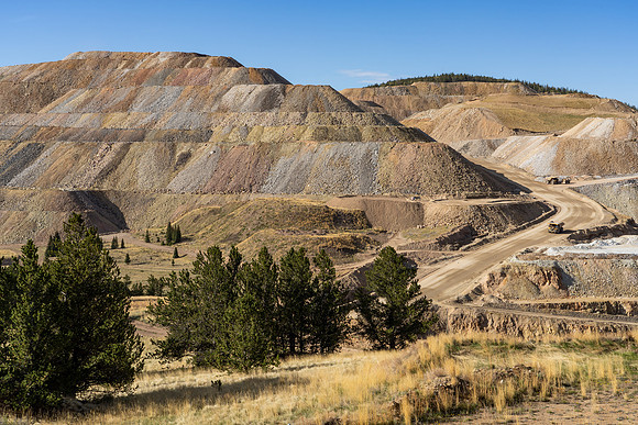 37.4 MB, 7000 x 4667: Heavy Trucks Hauling Loose Rock in Open Pit Gold Mine