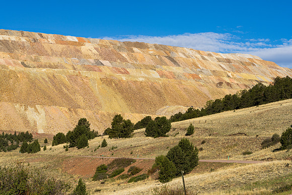 41.0 MB, 7000 x 4667: Piled rock around an open pit gold mine